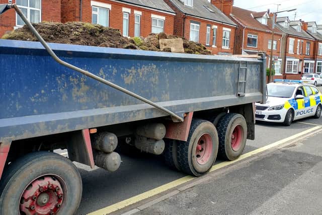 Officers in Shirebrook issued a fine to a truck driver transporting tonnes of soil and rubble without a safety net covering.