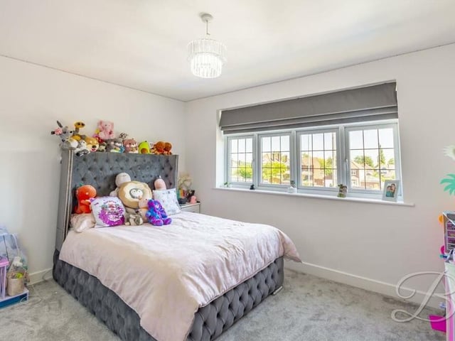 This smart bedroom is currently being utilised as an ideal space for a young child.