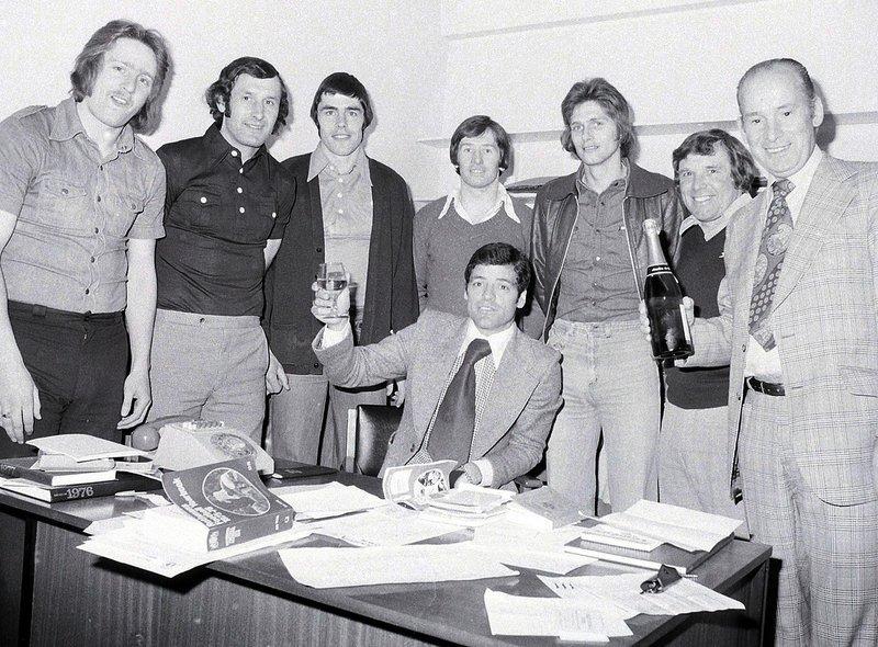 Stags celebrate promotion. Pictured from the left: Kevin Bird, Kevin Randall, Ernie Moss, Ian McDonald, Ian McKenzie, Jerry Clarke, coach, and club chairman Arthur Patrick. Seated is team manager Peter Morris.