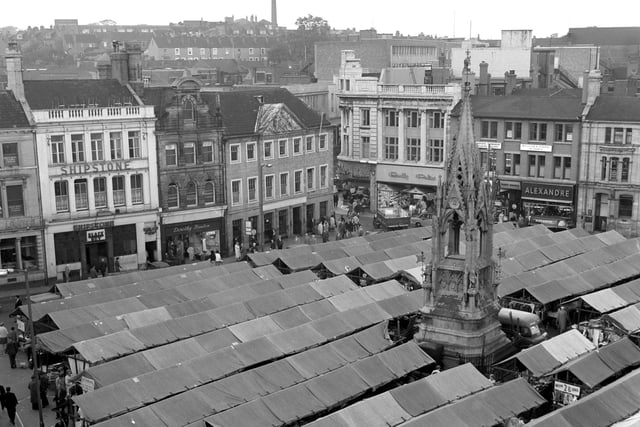 An aerial view of the market place in 1963 - look how many stalls there are.