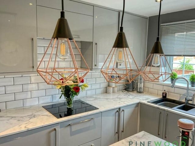 The breakfast kitchen is both attractive and fully functional. Other features include high-gloss door and drawer fronts, lots of storage and worktop space, a composite-style sink, downlights, laminate flooring and a uPVC window with Georgian bars.