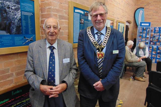 Coun Roger Jackson, vice Chair of Nottinghamshire County Council, with Ben Wells, Schoolroom Trustee