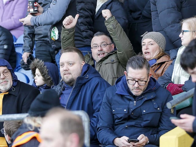 Stags fans watch the Sky Bet League 2 match against Crewe Alexandra at the One Call Stadium.