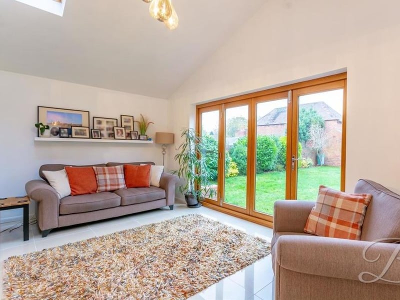 Another look at the pleasant living space in the kitchen, with bi-folding doors leading out to the back garden.