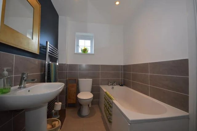 The family bathroom also doubles as an en-suite to the guest bedroom.