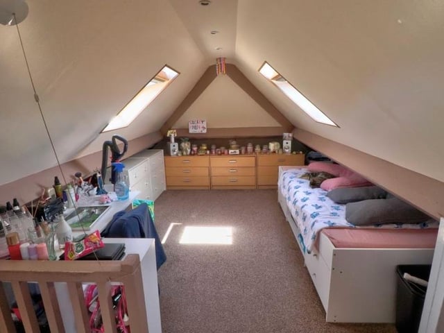 This is the attic room, which has a host of flexible uses. The current owners have installed Velux windows to the front and rear and are and are using it as a fifth bedroom.