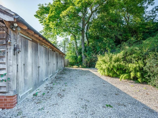 Time to step outside now, and let's make a beeline for the main outbuilding, which is this oak-framed barn that has been converted into a spacious annexe.