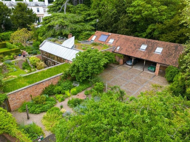 Outbuildings within the grounds of the £1.5 million property include a garage, a potting shed and a multi-purpose storage space, which currently houses windsurfing equipment.