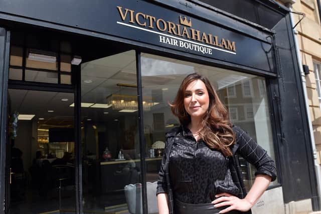 Owner Victoria Hallam outside her new hair salon at  Mansfield's Old Town Hall.