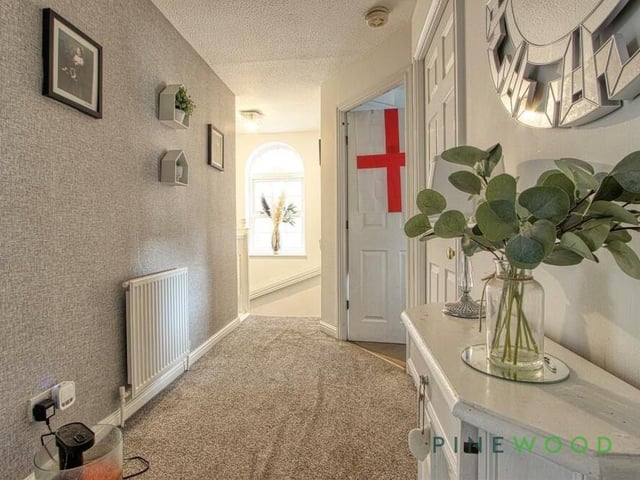 Along the landing is the smallest of the four bedrooms and also the family bathroom.