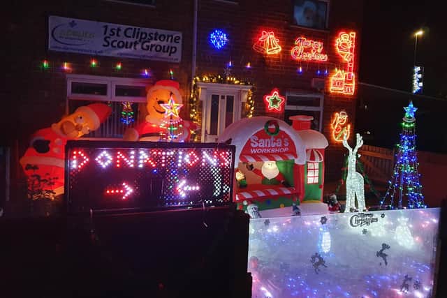 Donna's Christmas lights raise money for the village scout group each year.