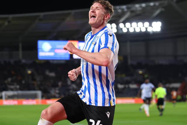Michael Smith of Sheffield Wednesday celebrates scoring their second goal during the Sky Bet Championship match between Hull City AFC and Sheffield Wednesday FC at MKM Stadium on November 26, 2024 in Hull, England. (Photo by Ed Sykes/Getty Images)