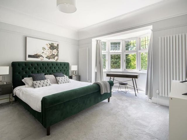 The main bedroom is a delightful space, with coving to the ceiling and two vertical radiators flanking a large bay window that faces the front of the house. There is access to a Jack and Jill bathroom.