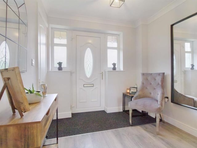 'Welcome in!' is the message that screams at you from this pleasant hallway, which guides you too all the main rooms on the ground floor of the Forest Town property.