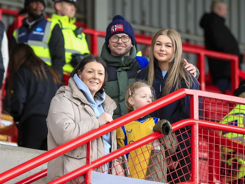Mansfield Town fans watch the defeat at Wrexham.
