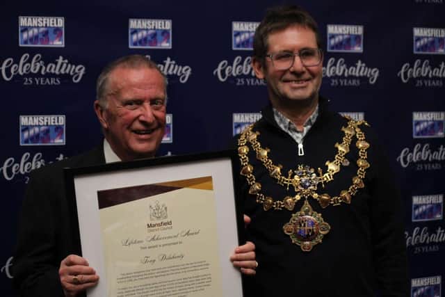 The award was given to Tony Delahunty by Executive Mayor Andy Abrahams for his services to Mansfield 103.2 on behalf of Mansfield Council.