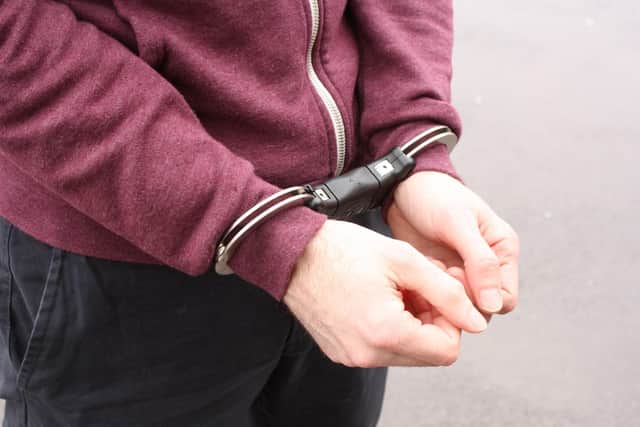 Derbyshire police have arrested a man after video showed a dog being kicked in a park in Blackwell.