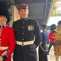 Former Kirkby schoolboys Nathan Musson, of the Irish Guards, and, right, Jordan Larua-Brooks, of the Parachute Regiment, bump into each other at the King's Coronation.