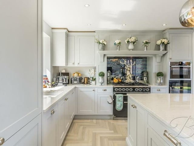 There's only one place to start our tour of the £675,000 Mansfield home and that's in the magnificent kitchen/diner, with its array of integrated appliances, elegant finishes and central island. It is perfect for both casual dining and entertaining.