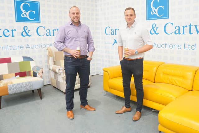 Dean Carpenter and Adam Cartwright  celebrate their first auctions.