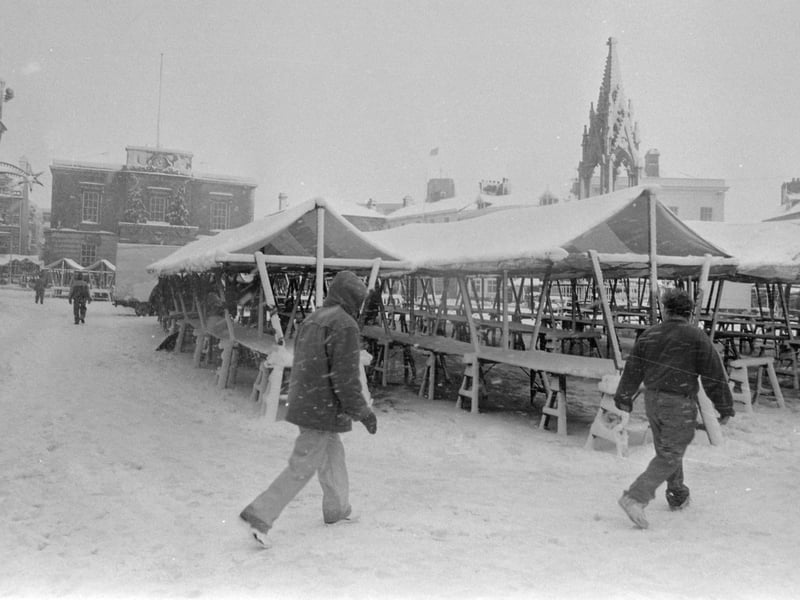 A snow covered market place.