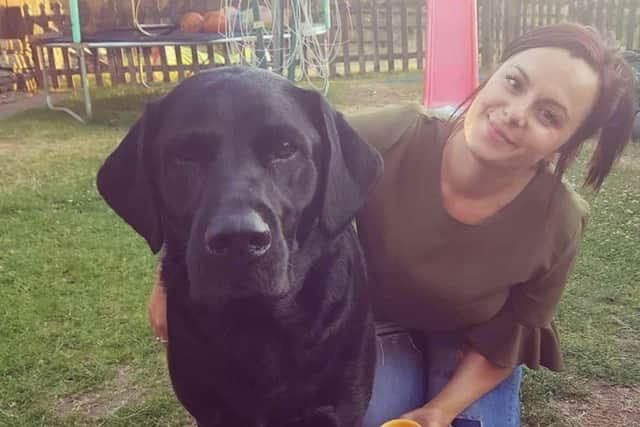 Lisa with her late dog, Milo.