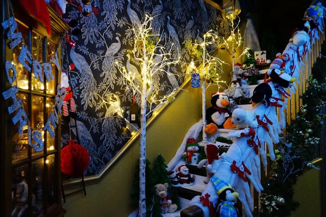 People travel from miles around to catch a glimpse of the "best" decorated pub.