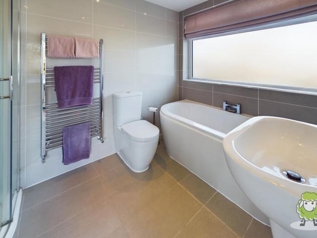 Alongside the three bedrooms on the first floor is this well appointed family bathroom. It includes bath, shower cubicle, wash basin and WC.