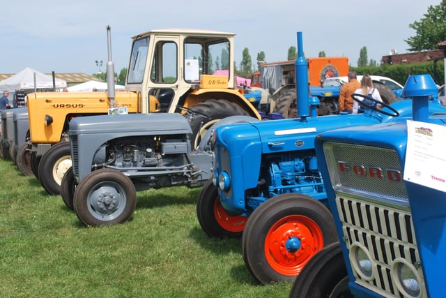 Vintage tractors on display.