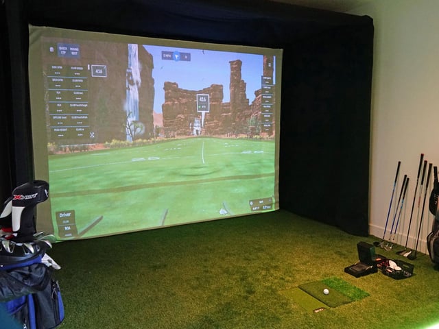 Office workers now have a golf simulator to make use of in break time.