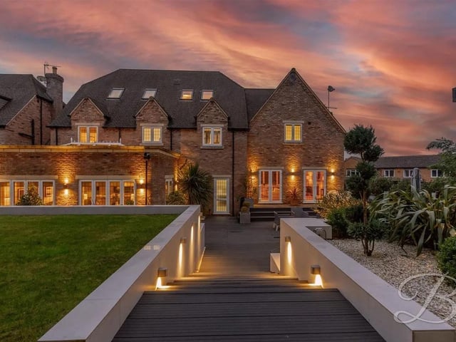 With over 4000 square feet, this substantial architect designed split level home combines privacy, luxury living, and meticulous attention to detail.