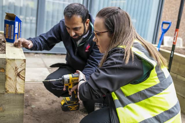 Apprentice Zoe Ruston hard at work with her company Travis Perkins, based in Mansfield.