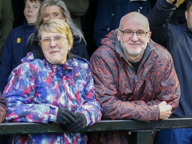 Mansfield fans at The EnviroVent Stadium for the match against Harrogate Town.