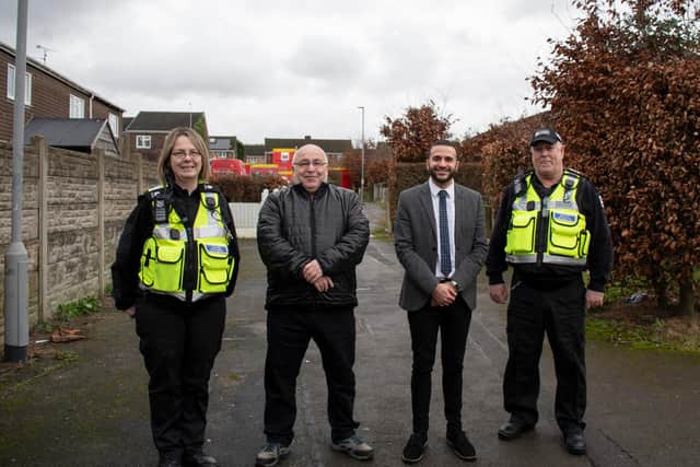 Coun Andy Meakin and Antonio Taylor, council community safety officer, with two Ashfield PCSOs at one of the hotspot alleys