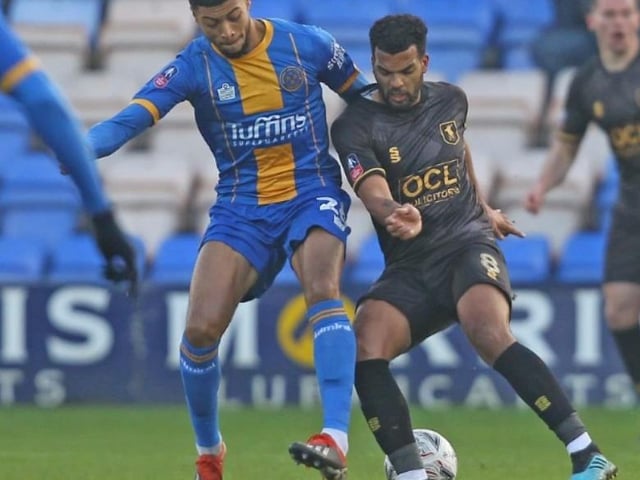 Jacob Mellis on the ball for Mansfield.