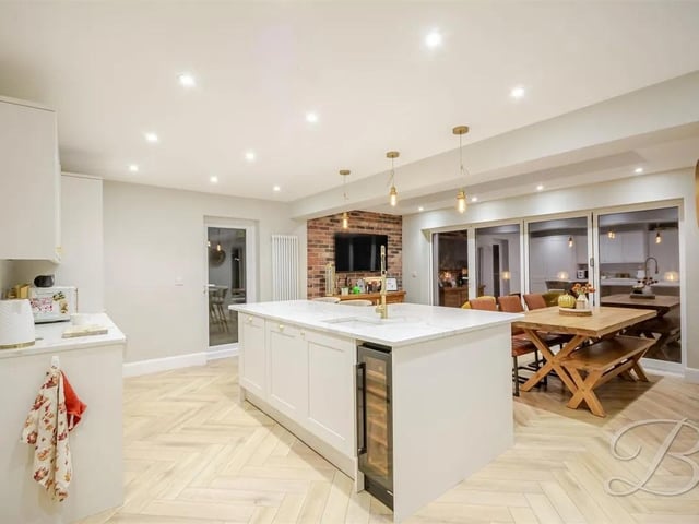 The heart of the home is undoubtedly the beautifully appointed kitchen - a stunning fusion of style and functionality.