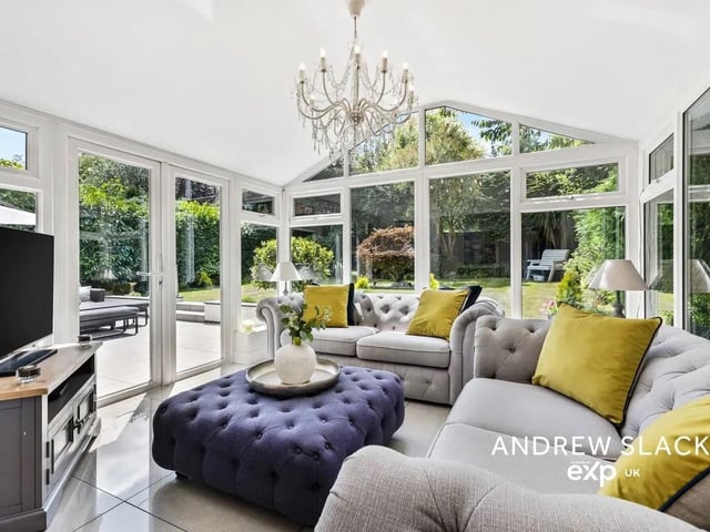 Soak up the light in the stunning conservatory with panoramic garden views.