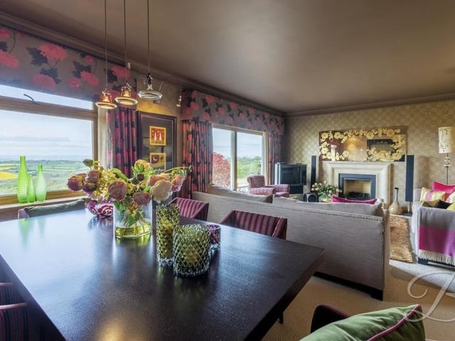 Part of the lounge is this delightful dining area. Sit-down meals with the family offer the added attraction of picturesque views of the countryside.