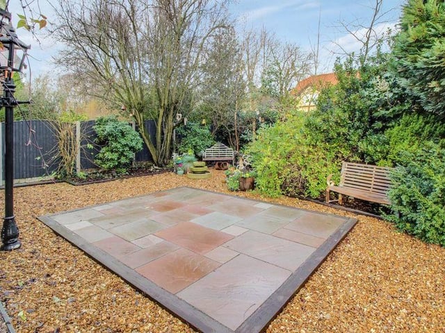 It's not hard to imagine yourself relaxing in this area at the side of the house on a warm summer's evening after a tough day at work.