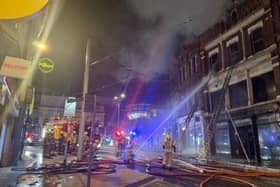 Two boys have been arrested on suspicion of arson after a large-scale fire broke out in Nottingham city centre.