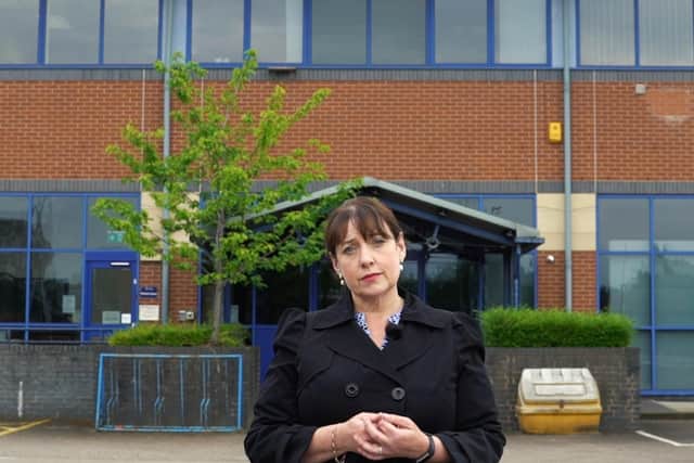 Mrs Henry outside Phoenix House.