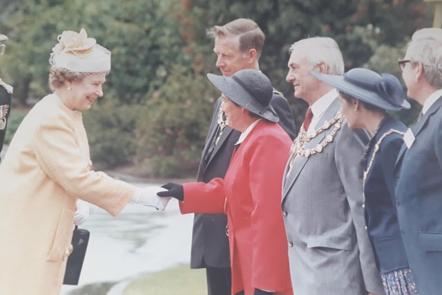 The Queen meets guests at Portland College in 1990.