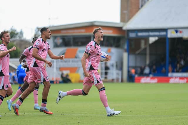 Mansfield Town forward Michael Smith celebrates his second half equaliser during the Sky Bet League One match against Peterborough Utd FC at Weston Homes Stadium, 22 August 2026, Photo credit Chris & Jeanette Holloway / The Bigger Picture.media