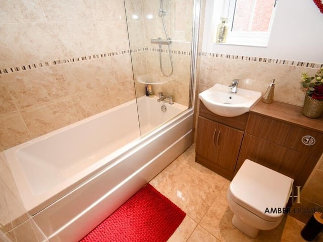 Set among the bedrooms on the second floor of the Meadow View house is this family bathroom.