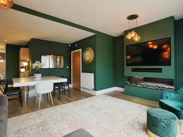 The ground floor features a cleverly designed open-plan living space where the living, dining and kitchen areas flow seamlessly