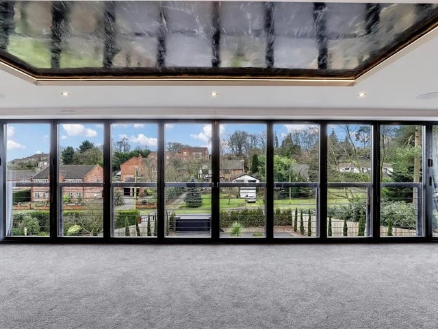 This stunning property is set in private enclosed south-facing garden with stunning views of the garden from inside the property. To the rear of the property lies a secluded enclosed south-facing garden featuring a stone-paved patio, a meticulously kept lawn, decorative wooden sleepers adorned with various plants and shrubs, all enclosed by panelled fencing.