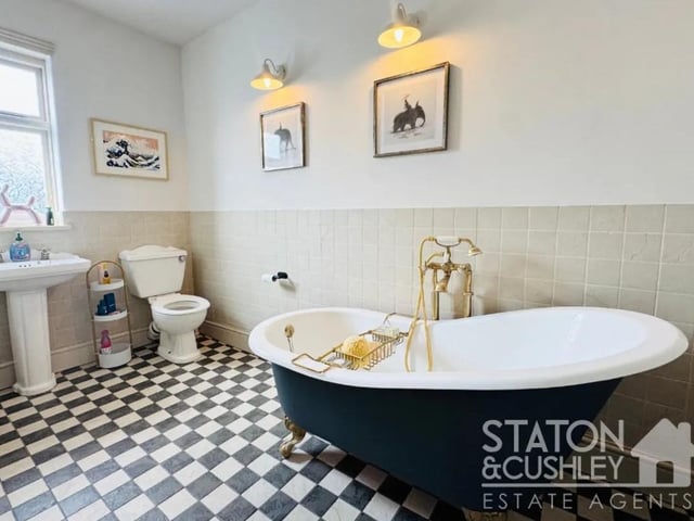The family bathroom is another feature of this impressive home with a fitted freestanding, roll top bath perfect for unwinding.