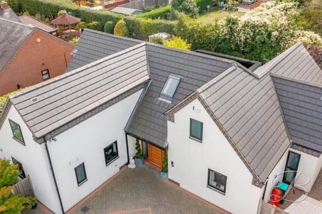 The distinctive exterior is just one of the many appealing facets that draw you to this four-bedroom, detached home on Clipstone Road West, Forest Town, which has a guide price of £500,000 with Mansfield estate agents BuckleyBrown.