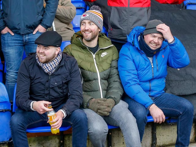 Mansfield Town fans enjoy the win at Stockport County