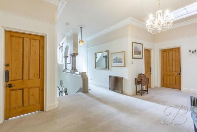 Arriving on the first floor, you are greeted by this lovely, spacious landing, which includes period marble columns and two stained glass windows to the front of the mansion. There is also an airing cupboard and access to the tower.